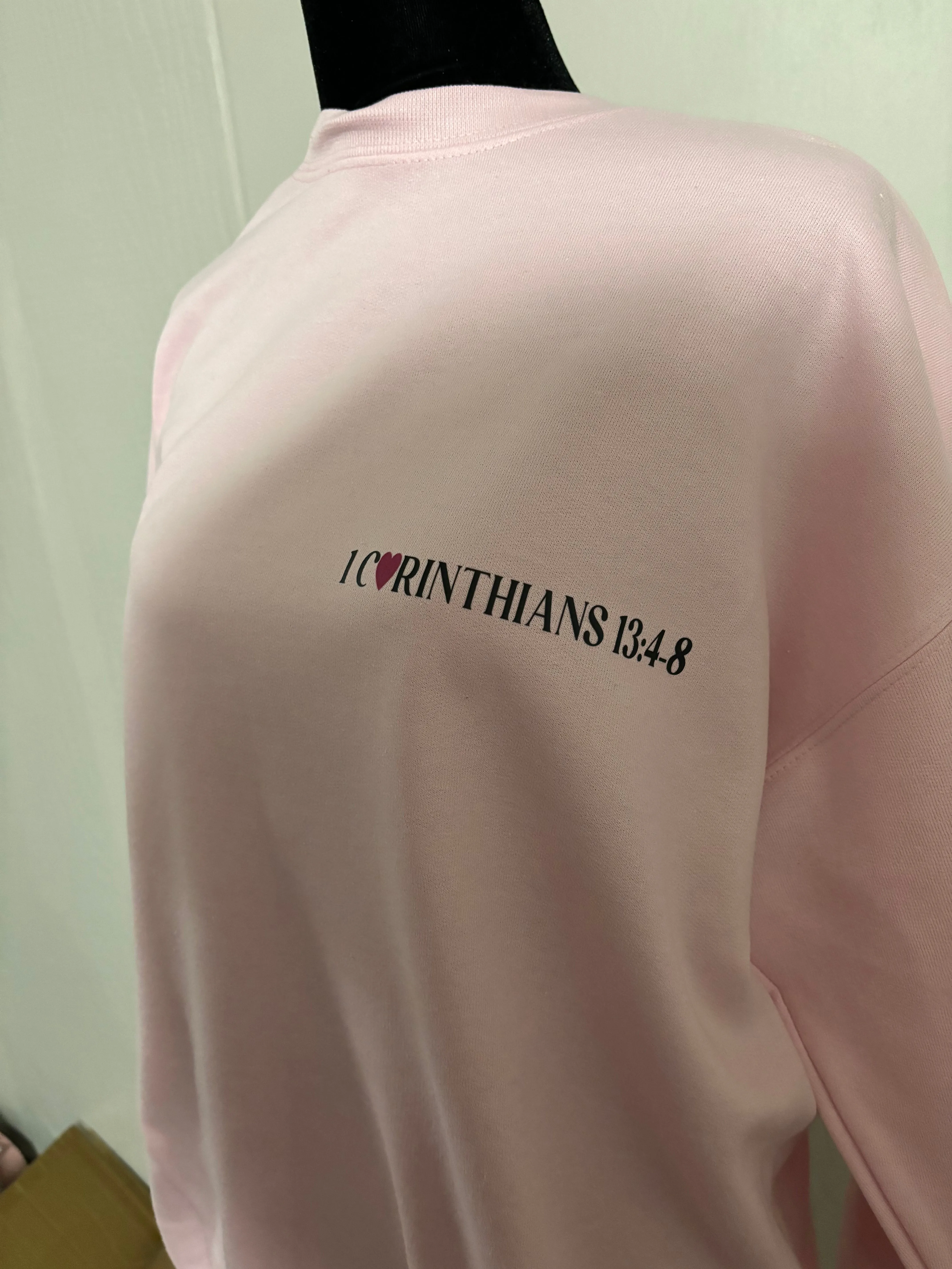 Love Never Fails Sweatshirt