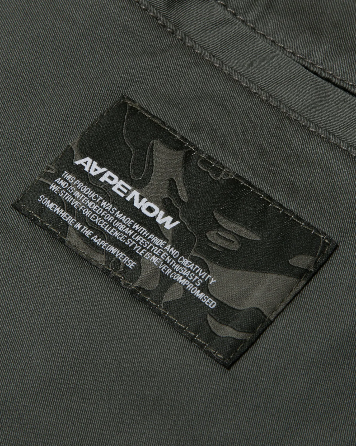 Moonface patch relaxed pants
