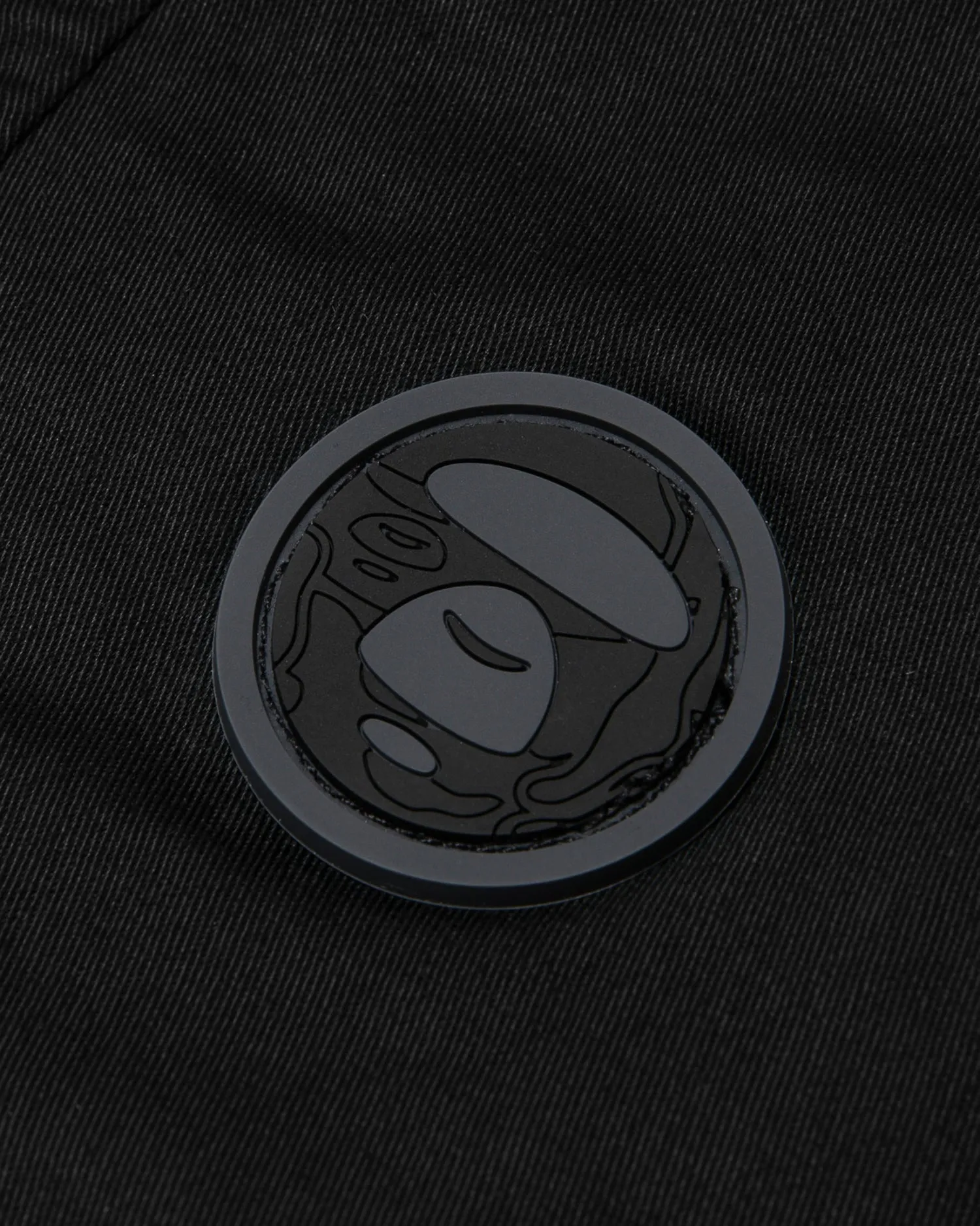 Moonface patch relaxed pants