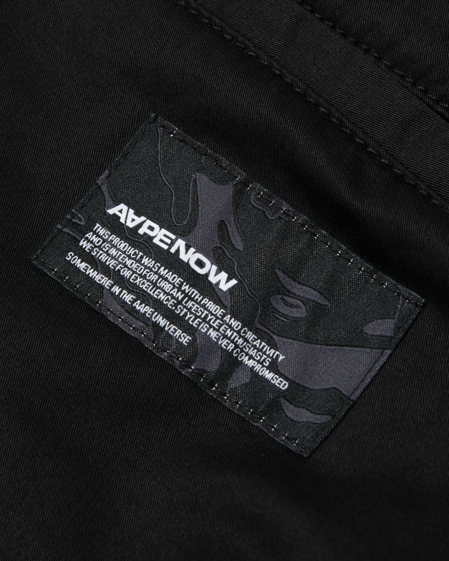 Moonface patch relaxed pants