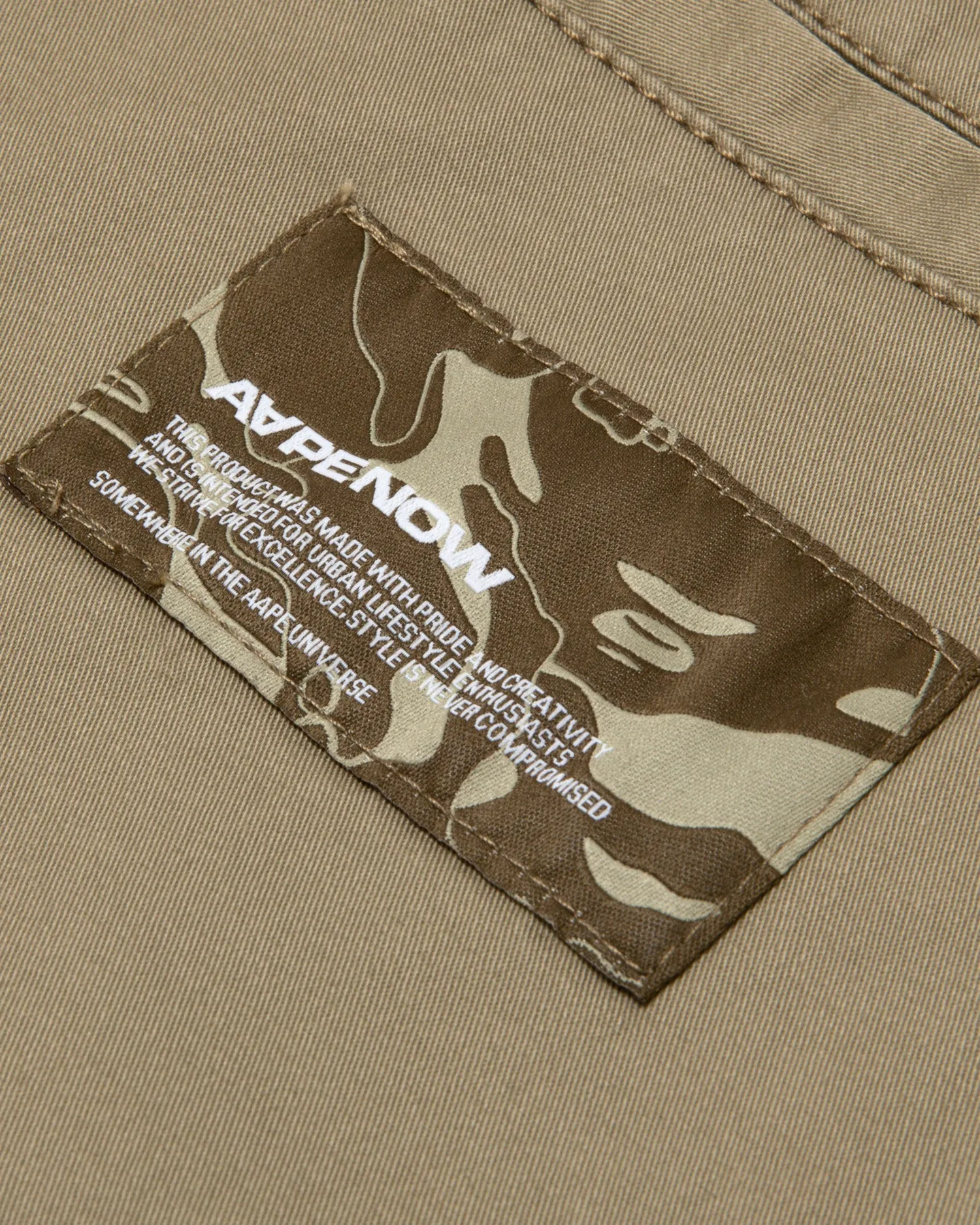 Moonface patch relaxed pants